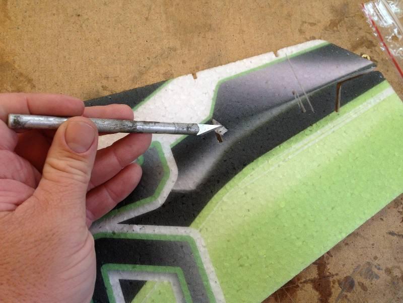 Remove the little tabs of foam that are in the SFG slots with a sharp knife Glue