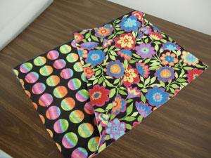 Prepare the fabric for the inner lining by cutting two pieces of the quilted cotton fabric 16 inches wide by 22 1/2 inches high.