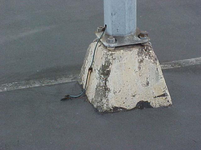 Example of exposed wiring Improper light pole ground Who Is Responsible?