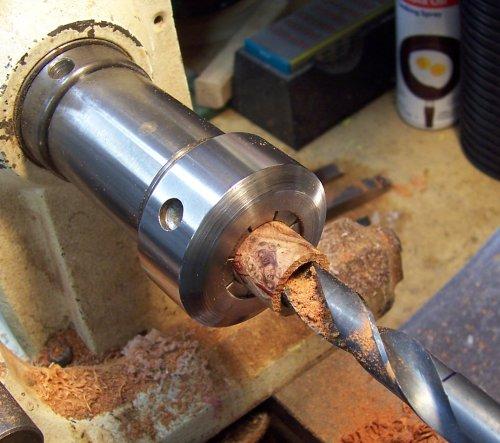 7. Again, the blanks mysteriously cut themselves on the band saw and one of them hopped into the Beall collet chuck for drilling.
