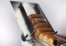 Sliced bread is inserted manually in one natural movement,