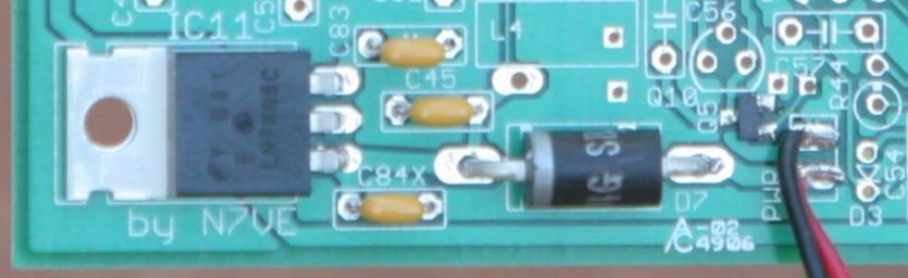 Figure 13. 5v regulator, protection diode, and 9v temporary connection. Note D7 diode polarization! Install IC11 (LM78M05).