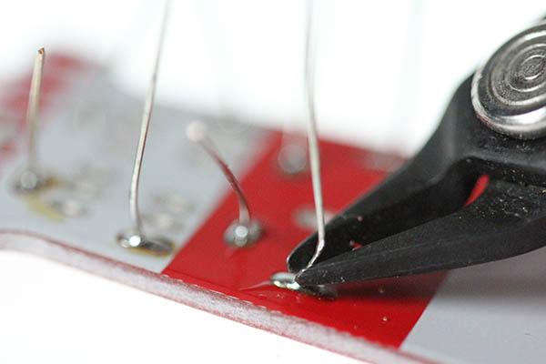 To solder them first tin your iron (apply a little solder to the end of the tip.