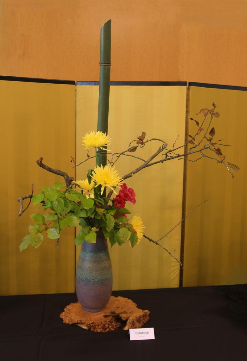 Uplifting By Doris Liu Materials: Bamboo, crabapple branches, Japanese stewartia branches,