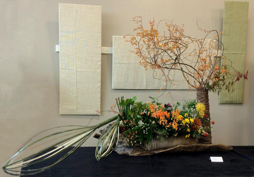 Autumn Galore By Chih Huang Materials: Bamboo, proteas, mums, Japanese stewartia branches,