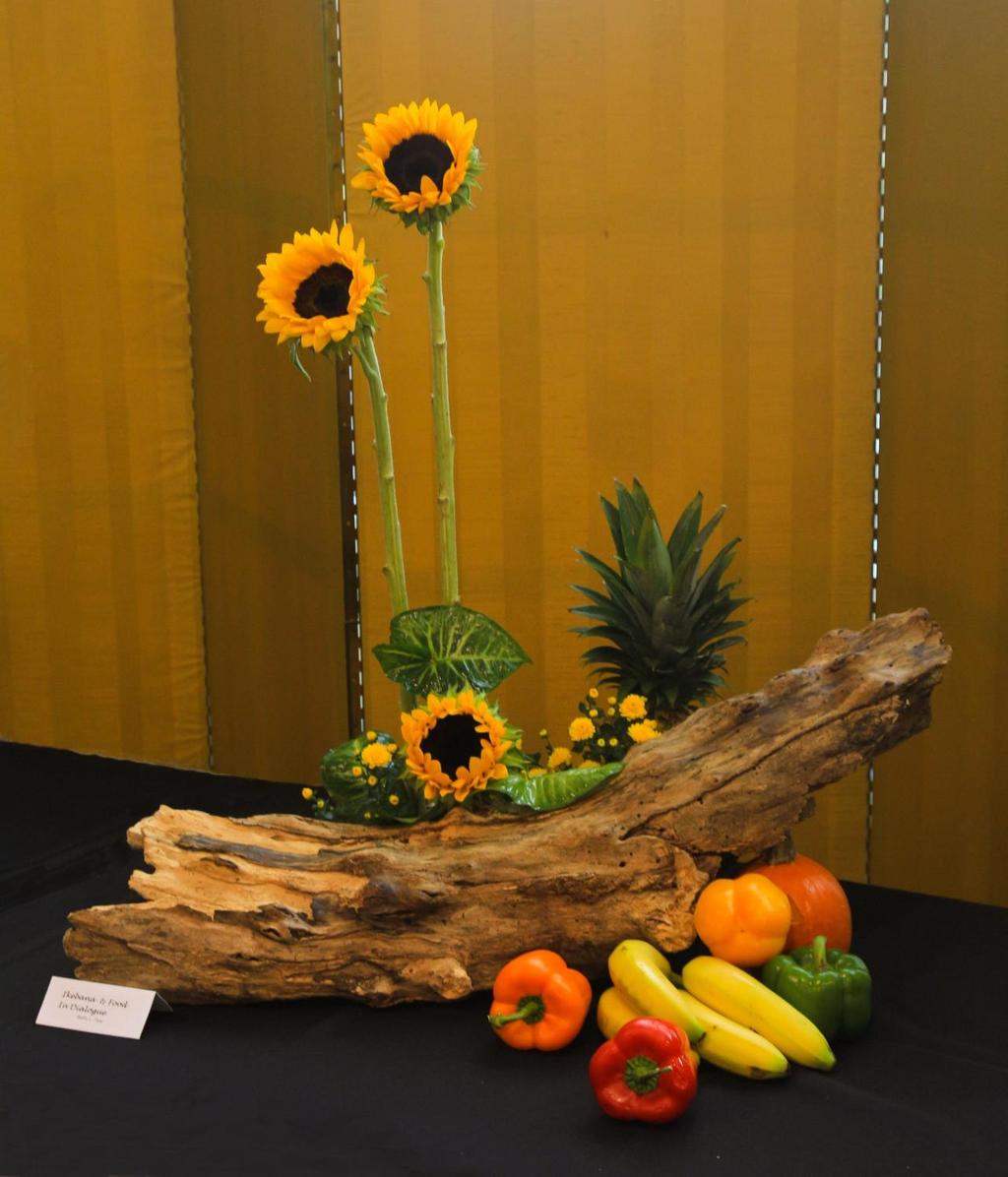 Ikebana and Food in Dialogue By Betty Tsai Materials: Sunflowers, mum