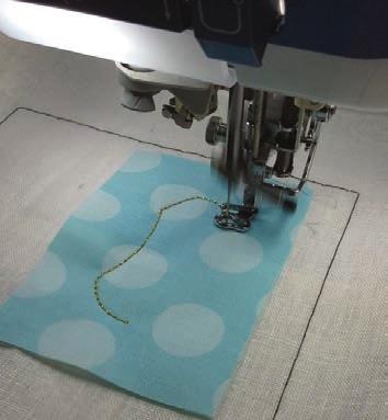 Even though your machine will show four different colours to embroider the raw edge appliqué trees, just use the colour