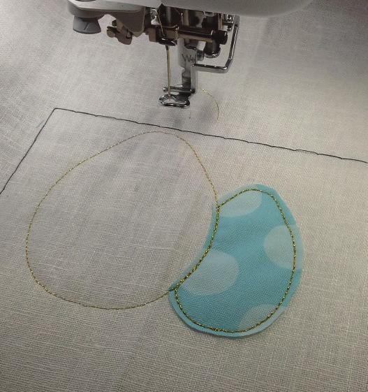 The different colours are so the machine will stop, allowing you to trim the appliqué fabric from around the trees