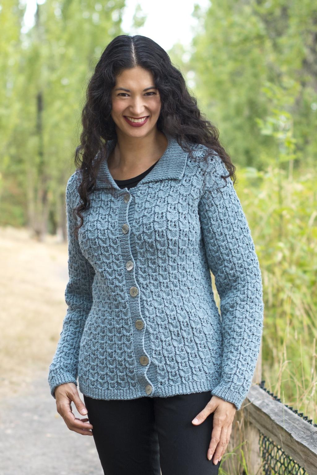 220 Superwash Cables and Lace Cardigan Designed by Melissa Leapman Skill Level: Intermediate Sizes: Small (Medium, Large, 1X) Instructions are for smallest size, with changes for other sizes noted in