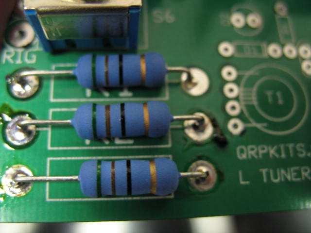 Step 9. Solder the R1, 2, & 3 resistors in as shown. Figure 11 Step 10. Solder D1 in and make sure that the band marking on the diode is placed the same way as the band on the silkscreen of the board.