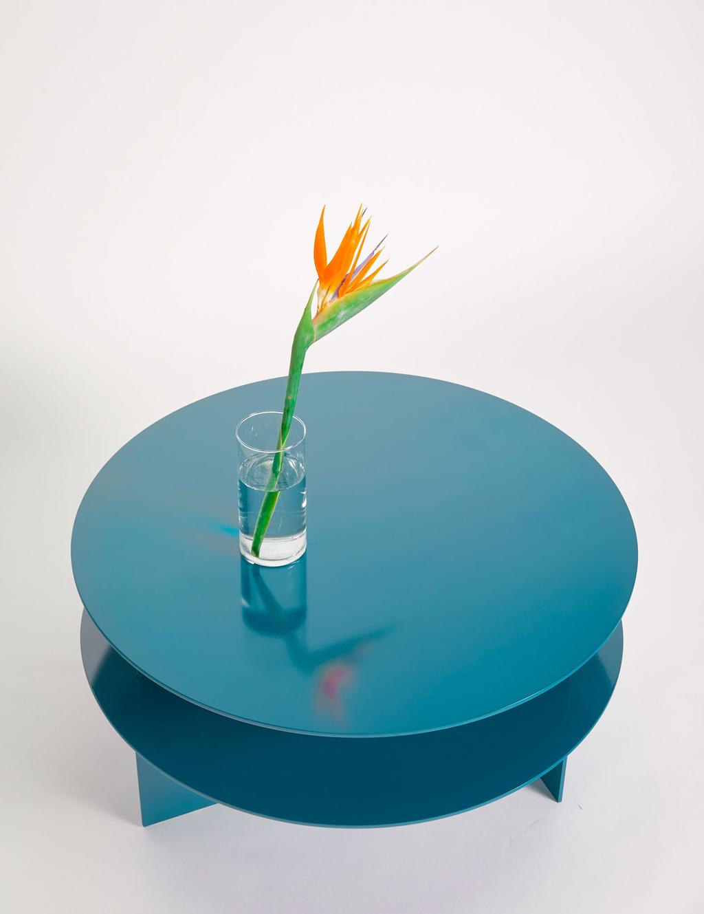 Sanora Coffee Table Sanora Coffee Table in Pacific Blue. Two-teir table constructed from precision cut 1/4 aluminim.