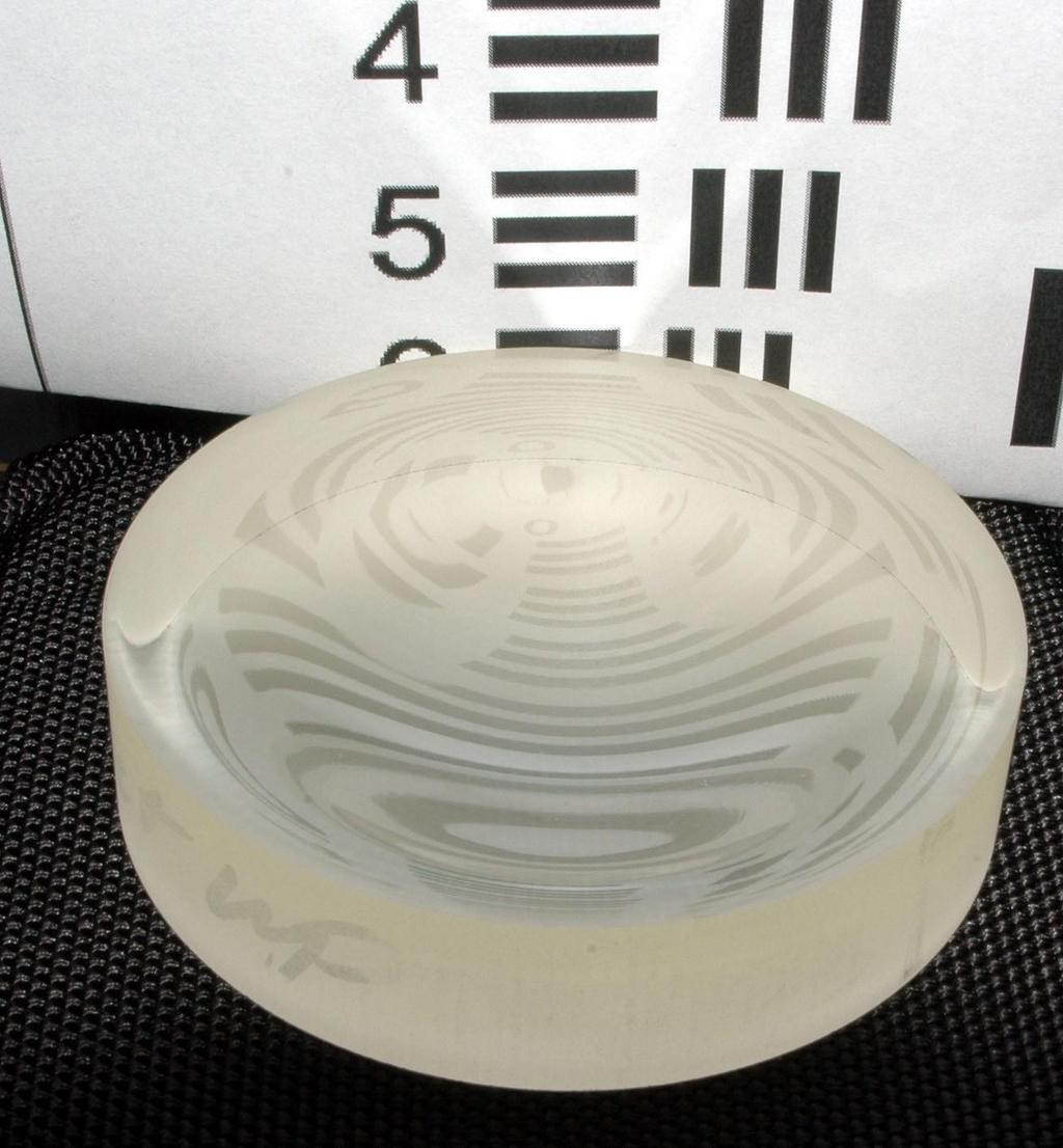 4 _ 111 5111111 'II Figure 8 - Aspheric surface with 950 microns departure over 45 mm Edge thickness - Deterministic polishing methods require margin on the surface outside the required clear