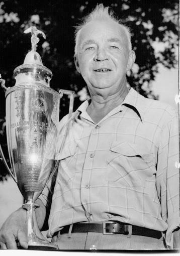 A. C, Witteborg Sr, avid golfer, with a golf trophy won at the Oneida Golf and Riding Club. In addition to golf, Mr. Witteborg enjoyed bowling and fishing.