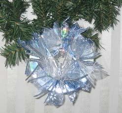 CD with Style Ornament Instead of throwing away a scratch CD, reuse it!