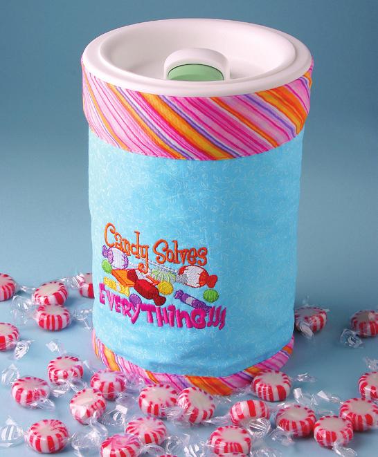 Construction of Candy Jar : 1. Measure your candy jar and cut the main fabric. Our cut fabric measured 9" x 18". 2. Plan embroidery placement and mark with disappearing ink pen.