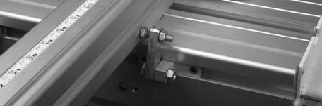 Loosen the two clamping handles; adjust the vertical adjustment screws so that the edge of the side