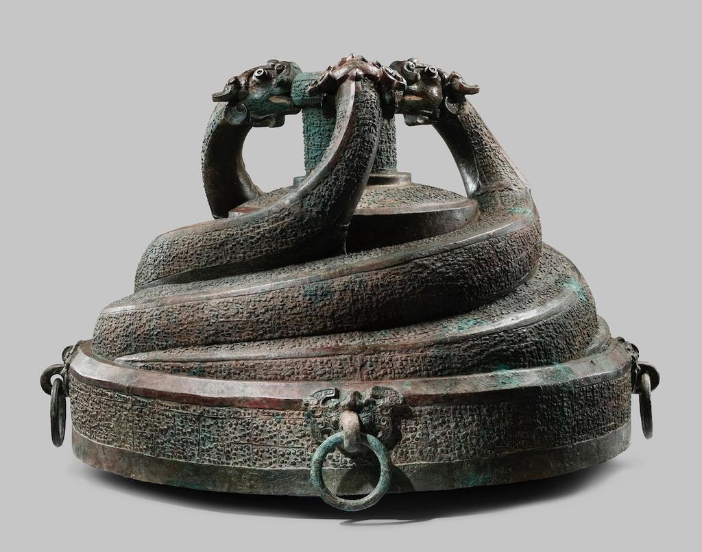 BRONZE DRUM STAND WITH THREE COILED DRAGONS SPRING AND AUTUMN PERIOD (770-476 BC)