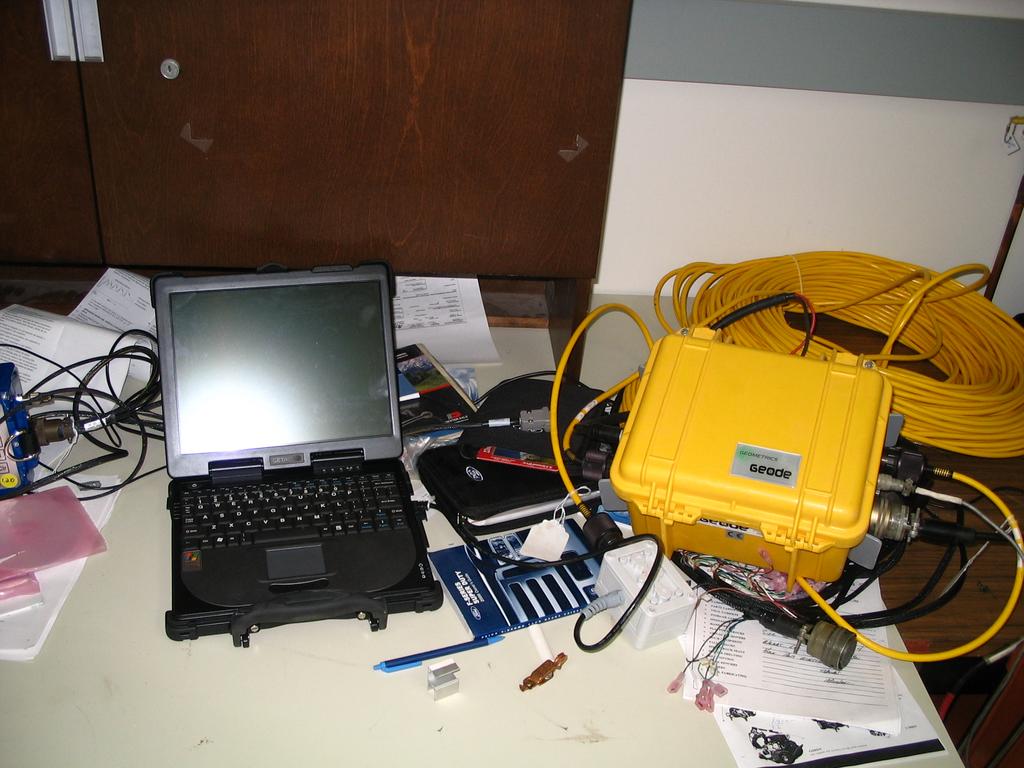 New geophysical equipment Geode system consists of 5 24-channel boxes with a ruggedized laptop computer for control and data recording, and 5 connecting cables and batteries. FIG. 2. One of the Geode units with the control computer.