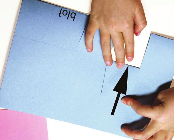 Make cuts starting at the fold. Cut towards the top edge of the paper.