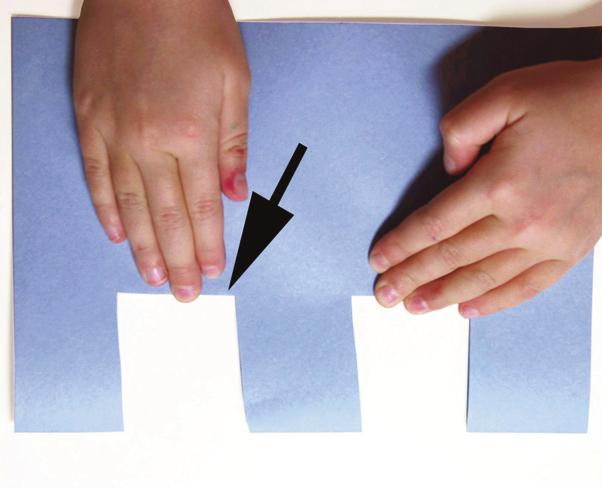 Fold the cut strips up towards the top of the paper making firm, crisp creases.