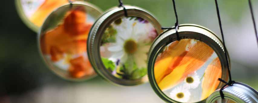 Nature Wind Chimes contact paper canning jar lids flowers/leaves/nature yarn or other string large stick CLICK FOR MORE DETAILS Trace canning jar lids onto a piece of contact paper.