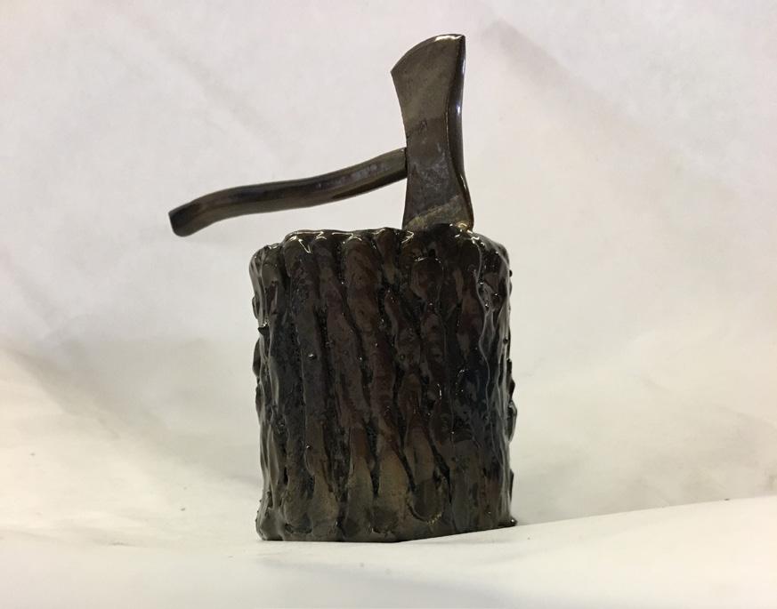 Make a Pencil Holder Part 4: Axe Fabrication 1. Tack weld both sides of the axe head to the handle. 2. File the axe head and the tack welds into a realistically shaped axe. 3.