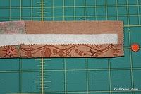 Fold in half and cut the strip in half to finish with 2 strips measuring 2.
