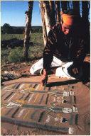 Navaho Sand Painter, 1978, Navaho, New Mexico, H: approximately 20 inches, Various colored sands,