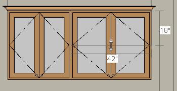 To edit the cabinets in an elevation view 1. Click the Select Objects button, then click on the wall cabinet above the range. 2. Click on the cabinet s bottom edit handle and drag it upwards. 3.