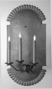 Both sconce bodies are hand raised, hammered into a convex shape.
