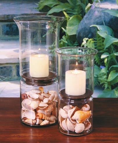 Hurricane Candle Holders These hand blown hurricanes retain many hundreds of small air seeds which not only add character to the