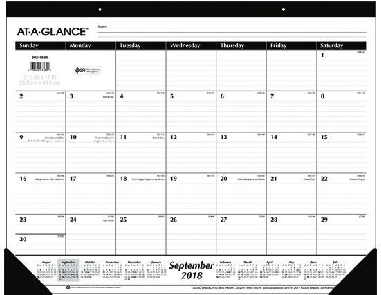 Clear cover protects calendar pages and can be written on with wet-erase marker and easily erased.
