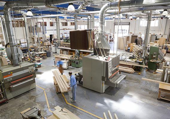 PRECISION ENGINEERING Most custom cabinet companies outsource their manufacturing.