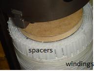 Fig 4. HTS windings wound around the former with spacers in between 2.3 Cryogenic equipment for cooling To maintain the transformer under cryogenic conditions, a vacuum Dewar, shown in Fig.