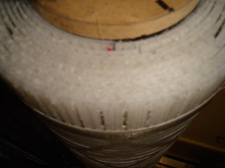 The vacuum is present to limit convection losses to the LN2 from the outside. To limit radiation losses, several layers of aluminized non-stretch polyester were wrapped around the inner vessel.