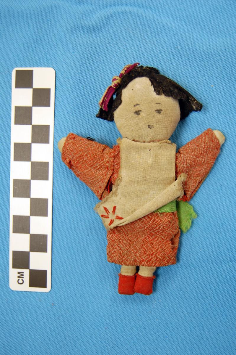 This doll was found in the Officer s knapsack.