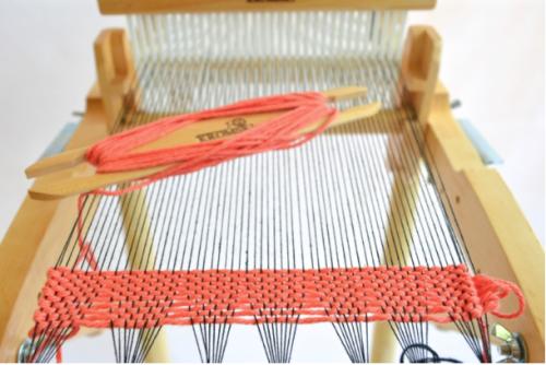 Notice how the warp threads begin to spread out. Can you see that the gap between the bundles is beginning to close?