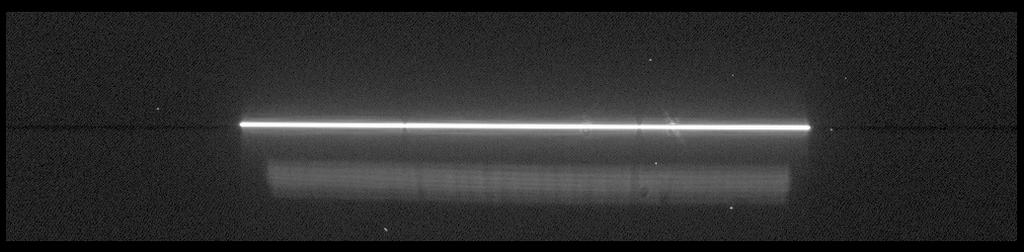 Serial Transfer Artifacts in High Exposure CCD Images For reference, a log stretch of a typical image of the HITM2 lamp through the 0.09X29 aperture is shown in Figure 3.