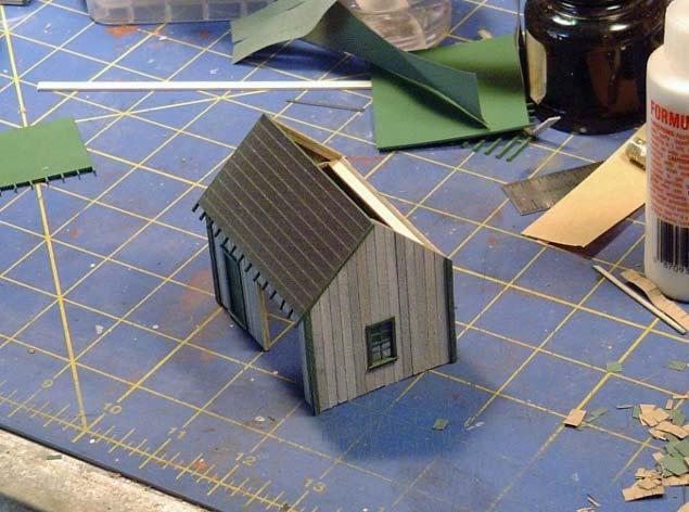 Figure 91 I glued the roof cards in place on the garage, sans the construction paper, in the same fashion that I did for the grocery store.