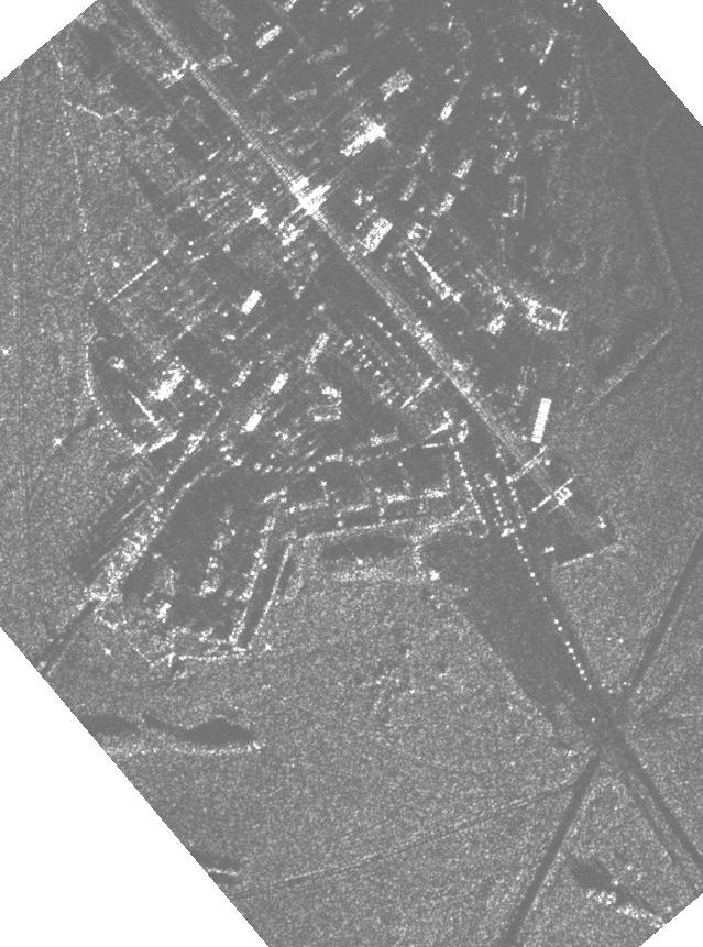 Towards the bottom of the bistatic SAR image in Fig. 6 there are some isolated tall trees from which it is possible to note the two shadows (one from the transmitter and one from the receiver).