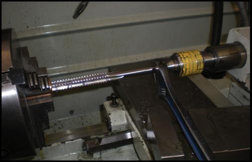 Set lathe feed to 6 TPI, remove tool post, set rpm to about 50, align tandem