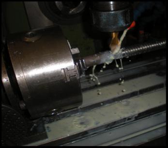 Use indexing head with tailstock for 180-degree rotation.