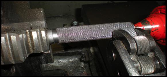Coarse knurl 3" of handle end, groove at termination of