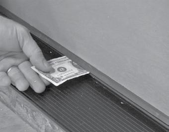 Apply sealant at the outside edge to the flashing to prevent water from getting behind the trim.