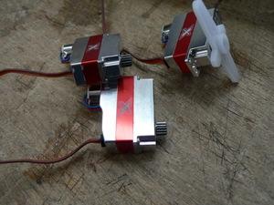 If your servos have mounting lugs, you may want to remove them, depending on how you plan to attach the servos