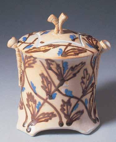 Lynda Katz, USA, Covered Jar, 8 in. (20 cm) in height, thrown, altered, and hand-built porcelain, glaze-trailed decoration, 1997. form the clay into coils or extrusions to the desired size for use.
