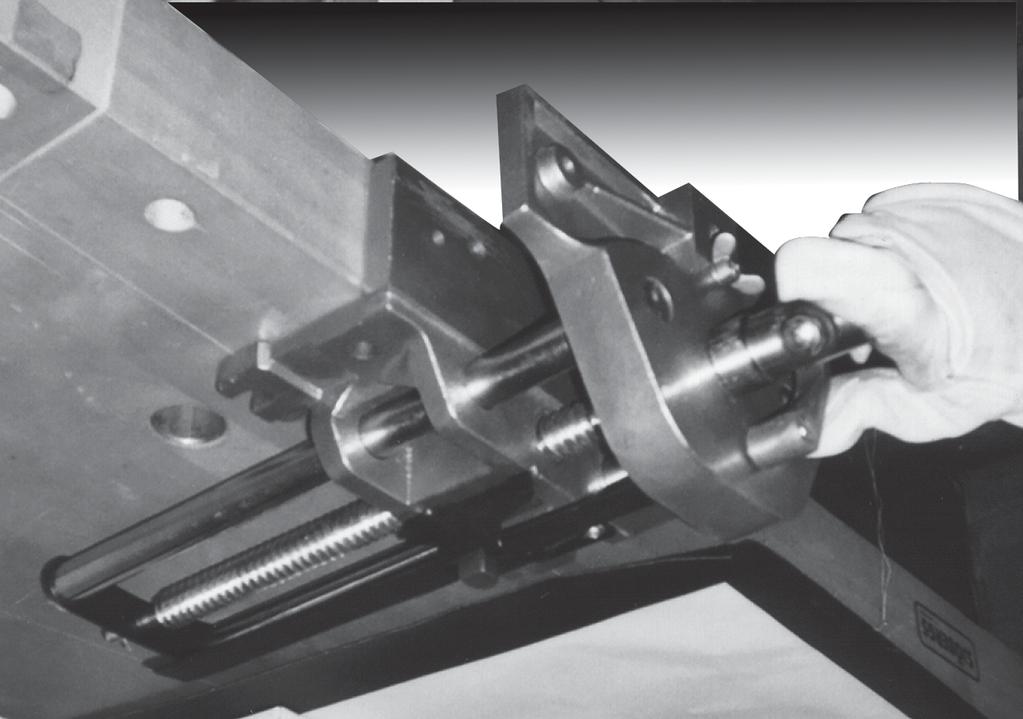Mounting Holes Thumb on Quick Release Lever (4) Vise Plate () Figure OPERATING INSTRUCTIONS Note: By pushing down on the Quick Release Lever (4), you can release the Jaws so the Jaws can be easily