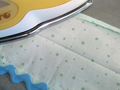 9. Fold in half, wrong sides together, and press to set a center crease line.