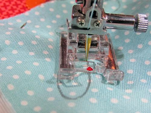 13. Re-thread with thread to best match the spout fabric in the top.