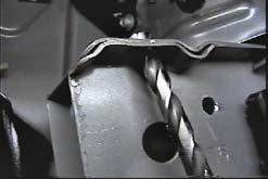 7-A 7-B 7. Drill one hole in the frame webbing using the 13/32 drill. Do this to both sides of the vehicle.